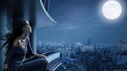 Mädchen schaut auf den Mond