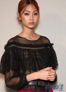 Bluse mit Federball 2019-2020